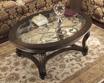 Norcastle - Dark Brown - Oval Cocktail Table Capital Discount Furniture Home Furniture, Furniture Store