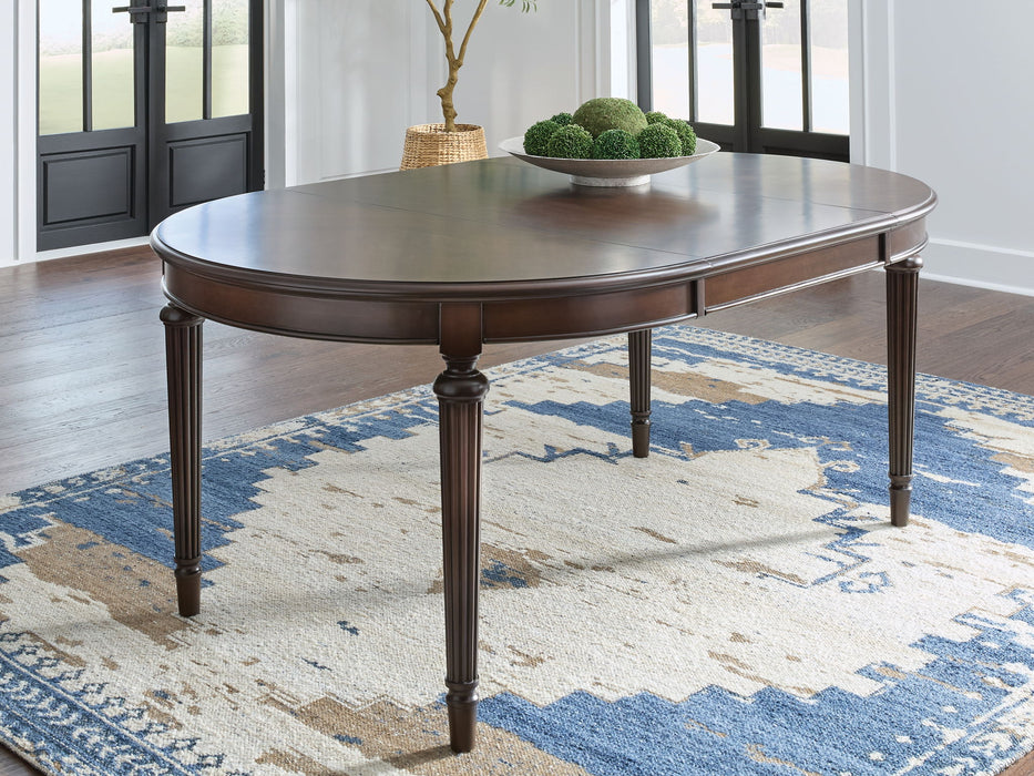 Lavinton - 8 Pc. - Dining Room Extension Table, 6 Side Chairs, Server - Brown