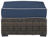Grasson - Brown / Blue - Ottoman With Cushion Capital Discount Furniture Home Furniture, Furniture Store